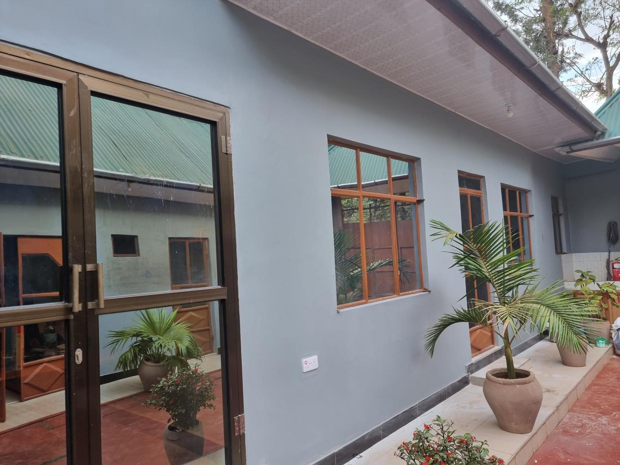 Kisanga Homestay Моші Екстер'єр фото